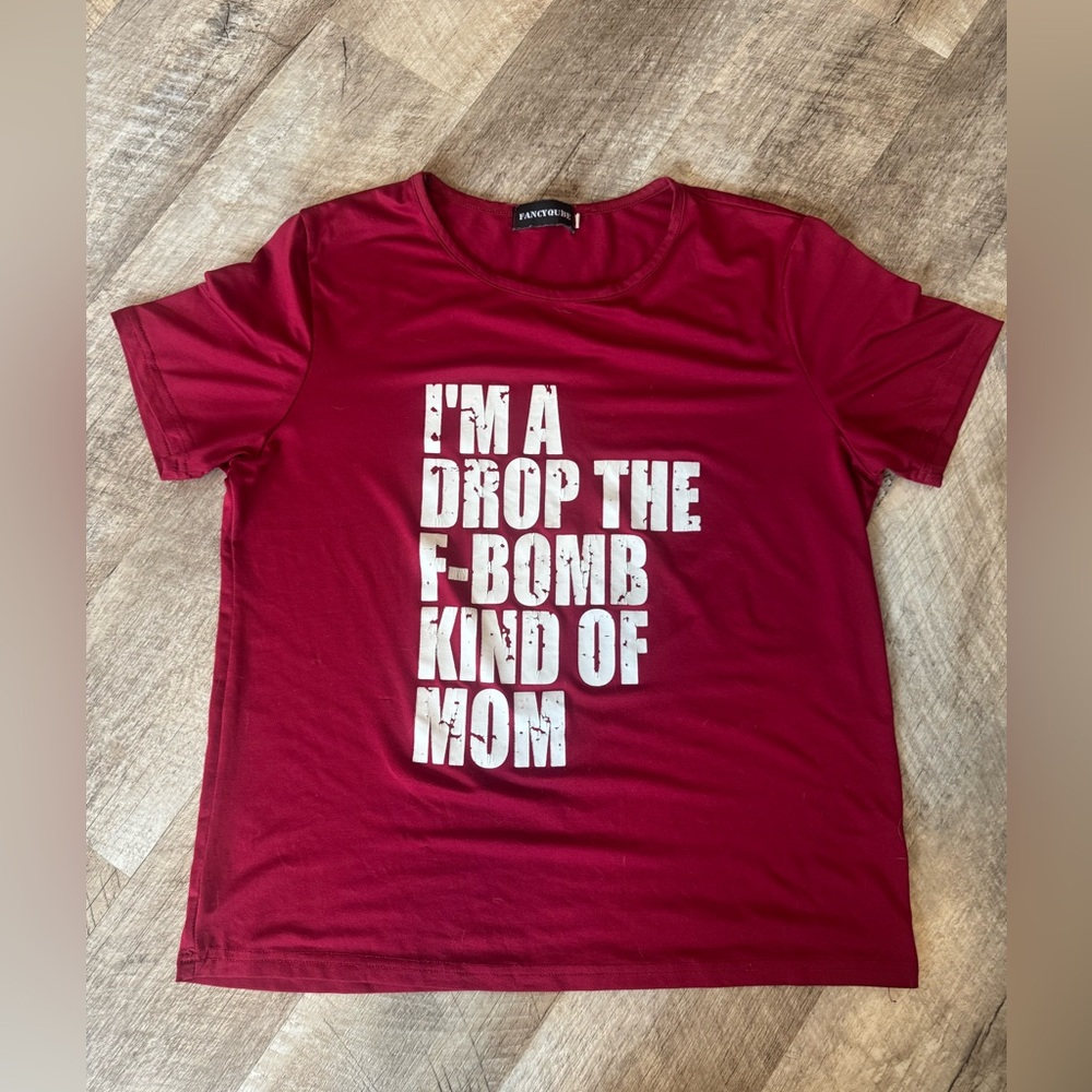 Fancy Qube size LARGE performance t-shirt with transfer saying